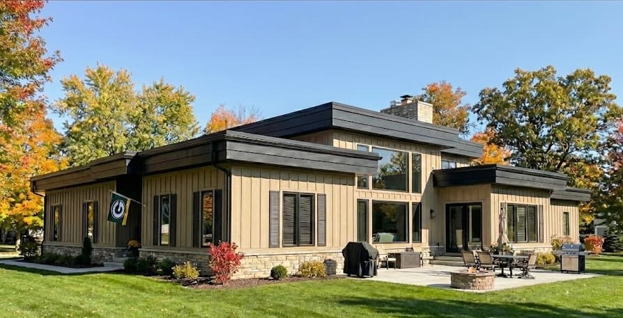 Rubber flat roof membrane installed on a completed modern home in Green Bay, Wisconsin by Pierce Roofing